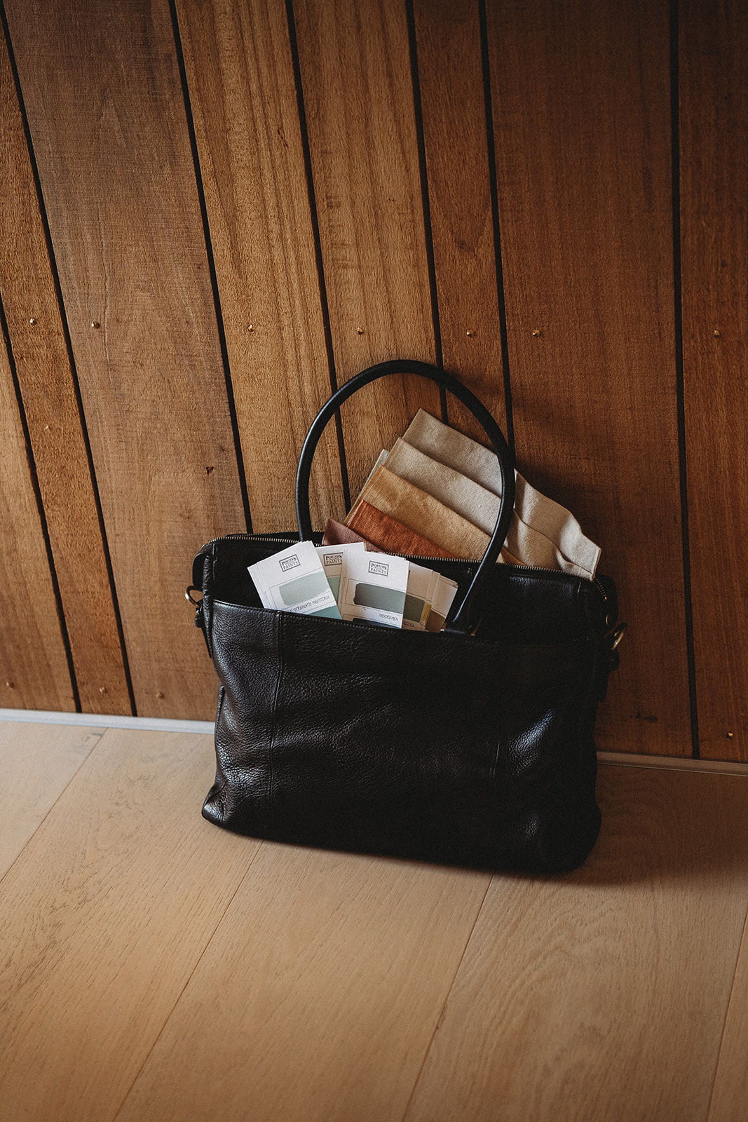 Handbag showing paint colour swatches